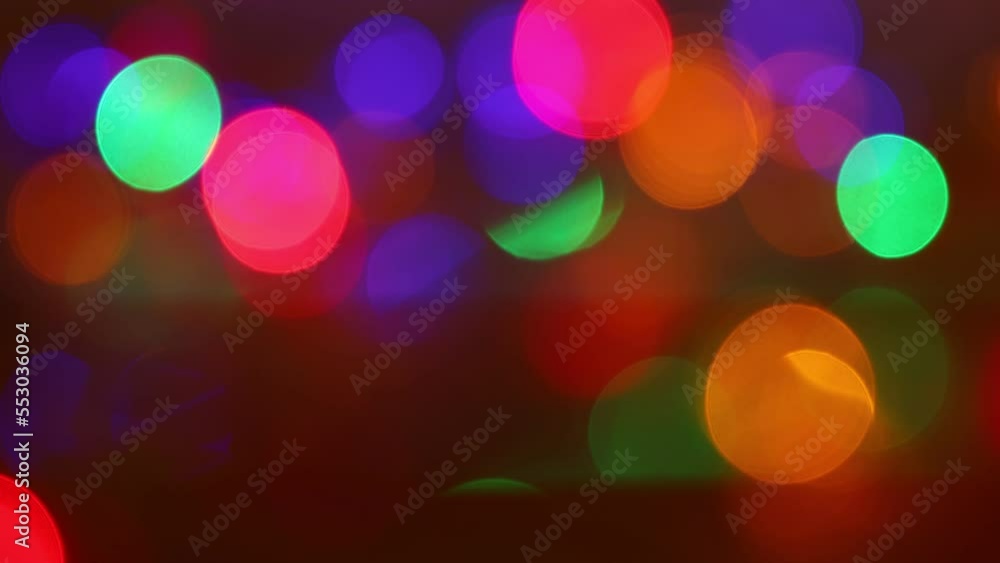 Poster flashing multi-colored light circles. festive bokeh