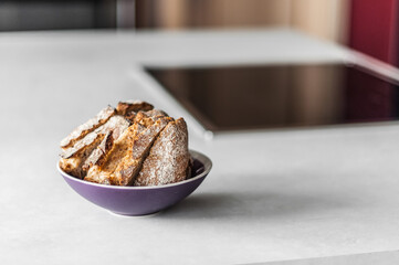 Slices of freshly baked bread in a ceramic plate.