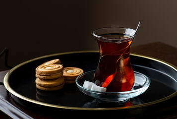 Turkish Tea presentation with biscuit on tray. Tea time for Turkish people. Turkish Tea in...