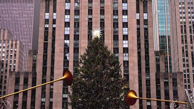 NEW YORK, NY, USA - DECEMBER 10, 2022: Rockefeller Center Christmas tree in New York City in December during holiday season with beautiful lights