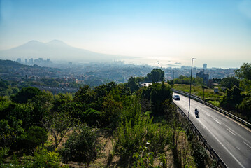 the city motorway from Naples to Rome passing Naples town and Vesuvius volcano scene