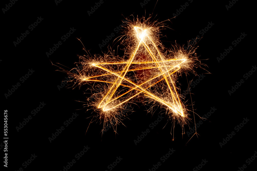 Poster sparkler firework light with star shape isolated on black background.
