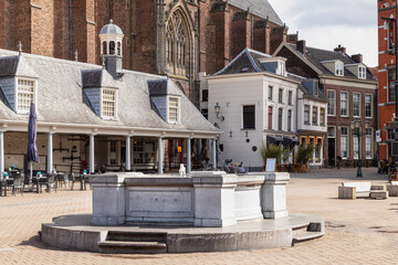 Stone fountain on the large city square - De Hof, in the center of the Dutch city of Amersfoort.