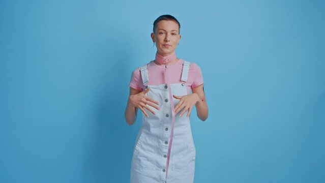 Overjoyed female person posing with bdsm collar, enjoys physical restrains during sex