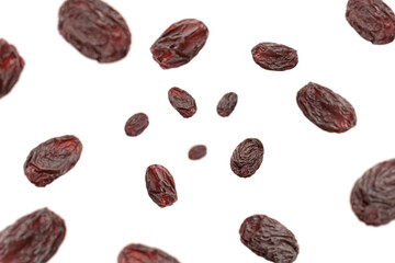 Falling Raisin isolated on white background, selective focus