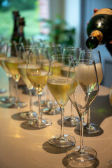 Tasting of brut and reserve champagne sparkling wine produced by traditional method in underground caves in Champagne, France