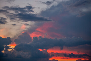 Dramatic sunset cloudscape with blue sky and clouds