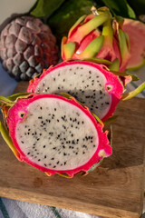 Fototapeta na wymiar Colorful dragon fruit, tasty tropical exotic fruits close up