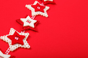 Christmas garland on a red background