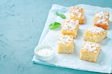 Coconut Breakfast Bars with fresh coconut sprinkles