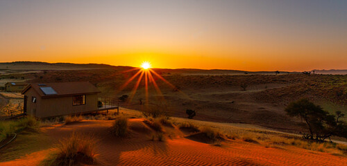 sunrise in the desert with colourful sand dunes in the namib desert in Namibia