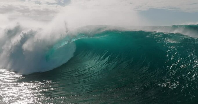 Big ocean wave surf aerial drone shot in Banzai Pipeline Hawaii