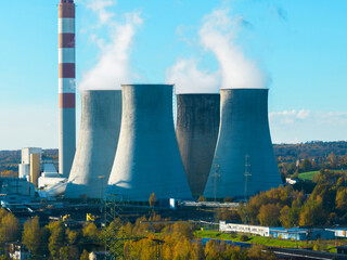 A power plant with huge chimneys, a view from the drone, from the air. Electricity creation concept. Great coal power plant, environment and environmental protection.