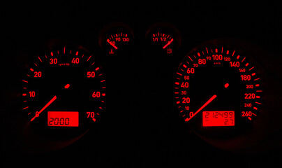 Car dashboard glowing a red light