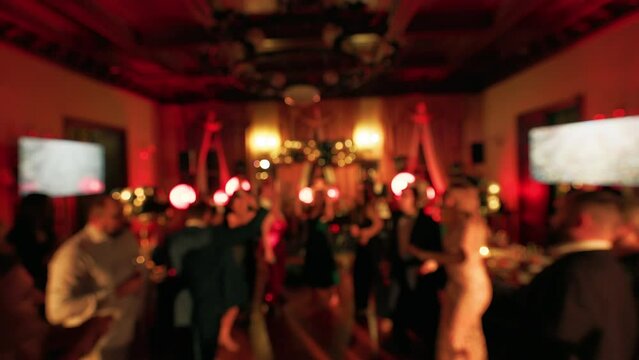 Unrecognizable: People are dancing and partying at a Christmas event