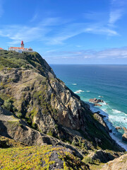Fototapeta na wymiar Lighthouse and caretakers house at Cape Roca