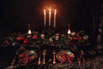Christmas dark academia vintage romantic table for two with fir, candles, mulled wine, red...