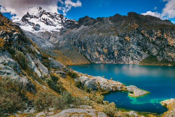 Turquoise Churup lake in Cordillera Blanca, snowcapped Andes, Ancash, Peru