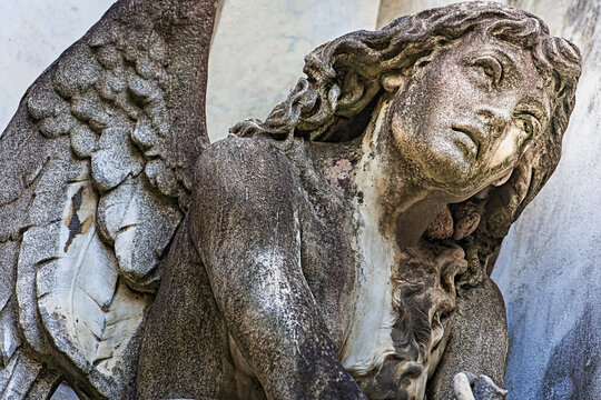 Young sad and beautiful fragile Angel, Recoleta cemetery, Buenos Aires
