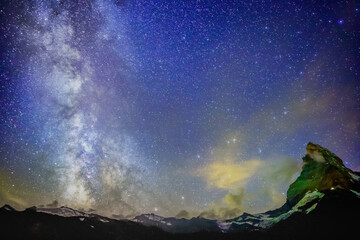 Milky Way galaxy above Matterhorn, Swiss Alps at night