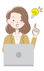 パソコン操作でひらめいたスーツ姿の若い女性