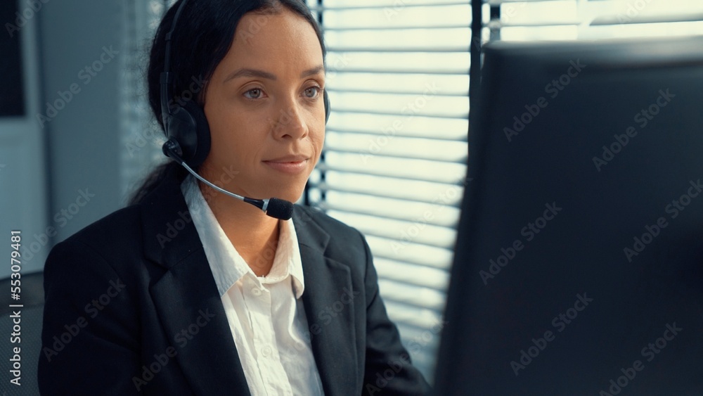Aufkleber competent female operator working on computer and talking with clients. concept relevant to both cal
