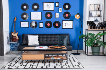 Living room decorated with vinyl records. Interior design - obrazy, fototapety, plakaty