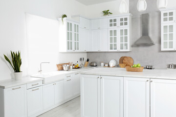 Beautiful kitchen interior with stylish modern furniture