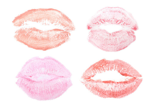 Set with lipstick kiss marks on white background, top view