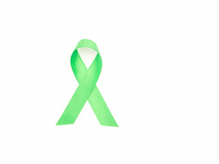 A green ribbon isolated on a white background