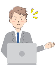パソコン操作で案内するスーツ姿の若い男性