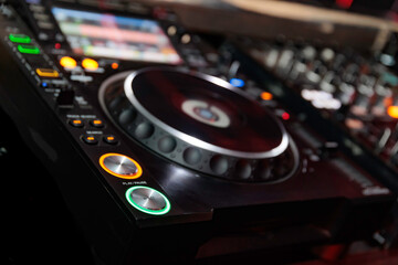 play / pause button of a dj table with defocused background