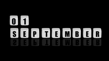 September 1st. Day 1 of month, Calendar date. White cubes with text on black background with reflection. Autumn month, day of year concept