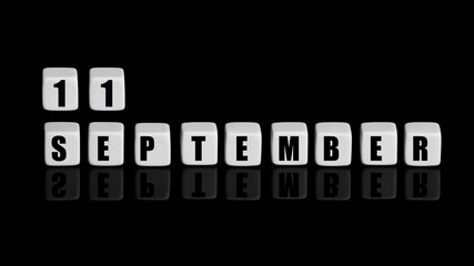 September 11th. Day 11 of month, Calendar date. White cubes with text on black background with reflection. Autumn month, day of year concept