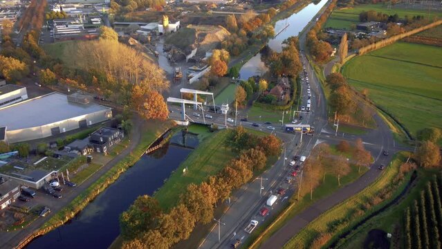 Helmond city with passage bridge over the small dam to the street, Kanaaldijk Z.O. wandelgebied.