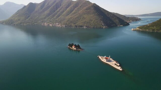 Aerial of islets off the coast of Perast in the Bay of Kotor, Montenegro. Surreal scenic nature