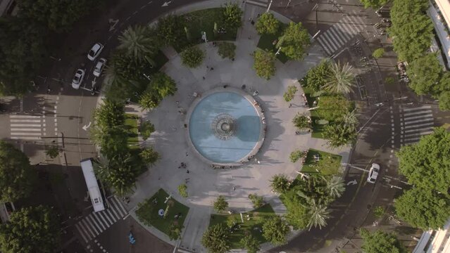Time-lapse of pedestrians and vehicles in Dizengoff Square Tel Aviv on a summer day #006