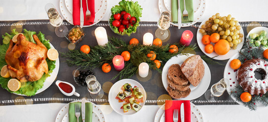 Dining table served for festive Christmas dinner, top view