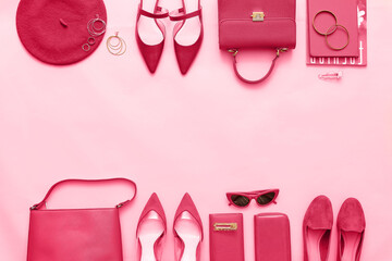 Stylish female accessories on pink background. Viva Magenta - color of new year 2023