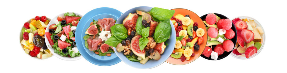 Set of fruit salads on plates against white background