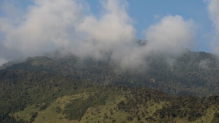 green mountains with clouds in the ecuadorian alps