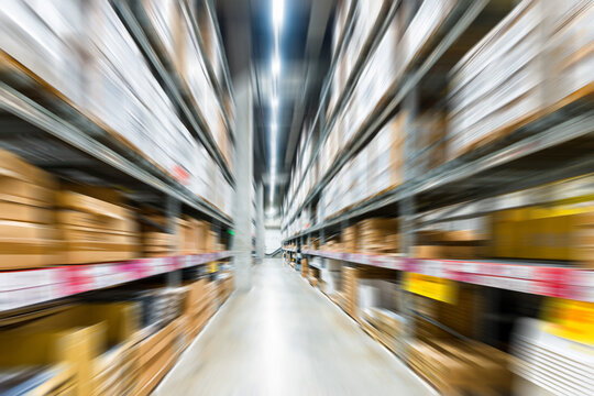 Motion blur effect of large warehouse with big boxes