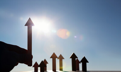 Arrow rising high and bright rising sun new year sunrise and stock finance economy industry growth...