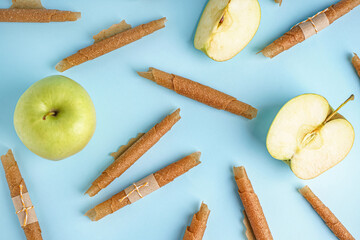 Tasty apple pastilles on color background