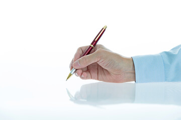 Businessman hand holding a pen isolated on white background