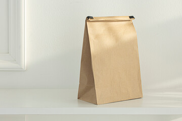 Brown kraft paper bags isolated on white background.