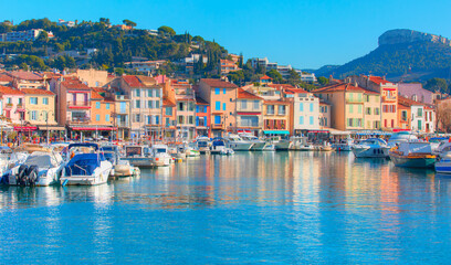 Fototapeta na wymiar Colorful traditional houses on the promenade in the port of Cassis town, Provence