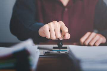 Businessman validates and manages business documents and agreements, signing a business contract...