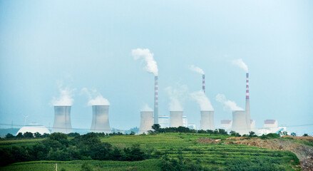 Fototapeta na wymiar Cooling towers of power plant