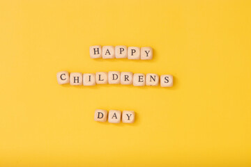 Universal children's day, inscription children's day on a yellow background, with a globe